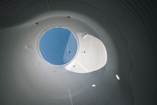 Skylight within 'The Throne', a 3D-printed portable toilet by To.org and Nagami, installed in Gstaad, Switzerland
