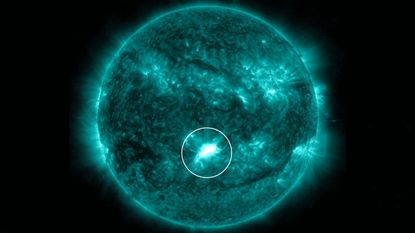 A picture of the sun with the new solar flare circled