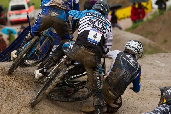 There were pile ups a-plenty here - Dan Atherton (4) of Commencal going down in 1/8 final heat