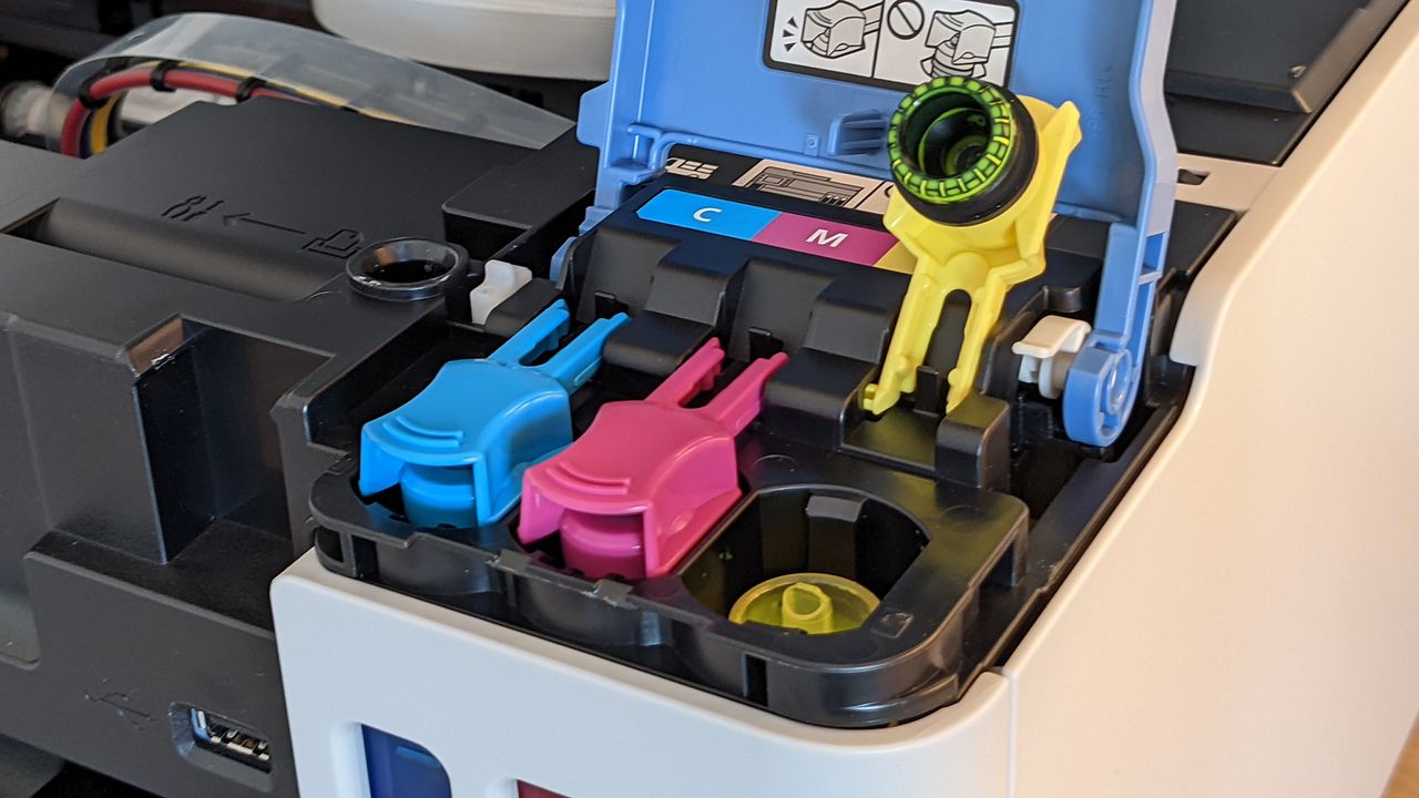 A closeup of the Canon MAXIFY GX70505's ink refill ports