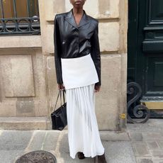 @sylviemus_ spring outfit black leather blazer and white proenza schouler maxi skirt