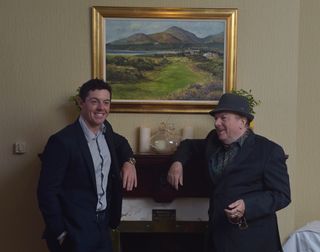 Rory McIlroy (L) meets Van Morrison ) who performed at a gala evening in aid of the Cancer Fund for Children hosted by the Rory Foundation at the Slieve Donard Hotel during Day One of the Irish Open at Royal County Down. Credit: Getty Images
