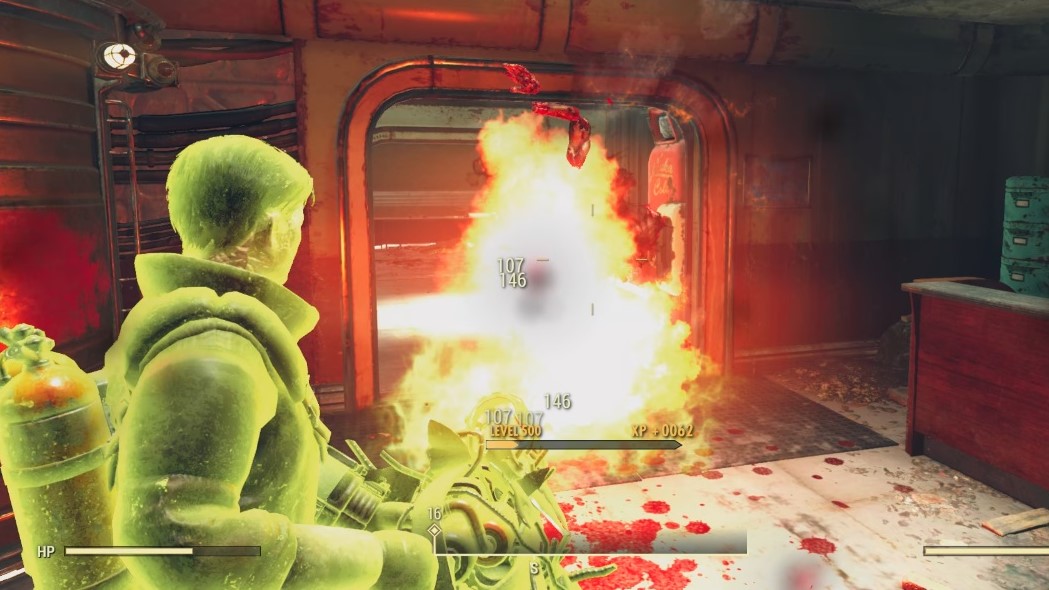 Fallout 76 character glowing green with radiation and using shooting flames againt an enemy.