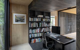 The office serves as a buffer zone between the house's public and private spaces