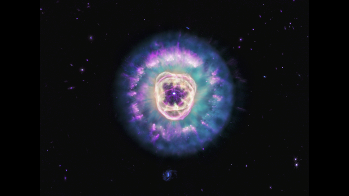 A purple center with a white dot at its center is surrounded by purple glowing layers.