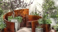 RHS Chelsea Flower Show 2026 seating area with potted plants