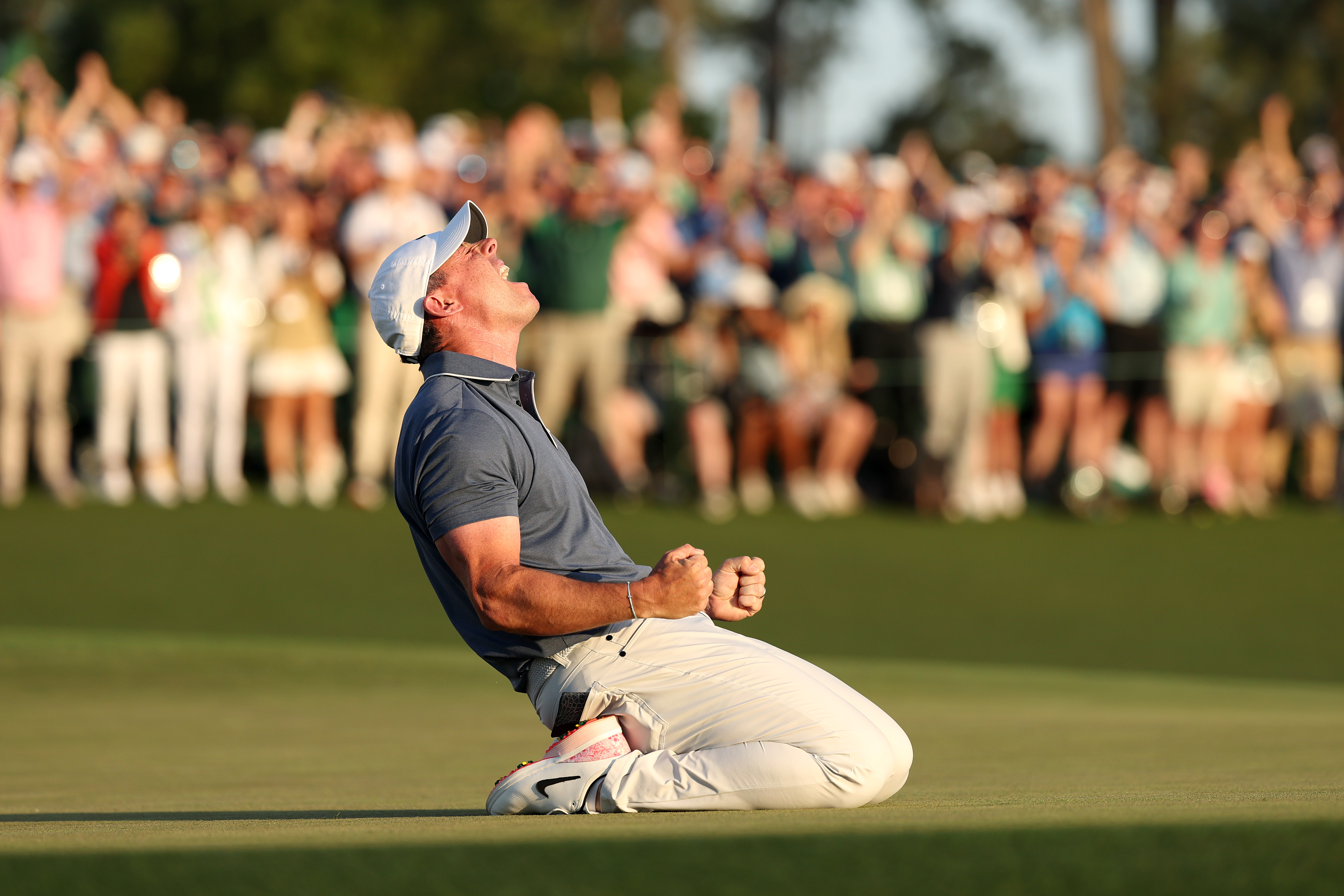 AUGUSTA, GEORGIA - APRIL 13: Rory McIlroy of Northern Ireland celebrates winning the 2025 Masters Tournament after the playoff hole on the 18th green during the final round of the 2025 Masters Tournament at Augusta National Golf Club on April 13, 2025 in Augusta, Georgia. (Photo by Richard Heathcote/Getty Images)
