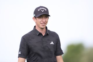 Tom McKibbin smiles during the 2025 Hero Dubai Desert Classic