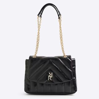 Black patent quilted handbag from River Island