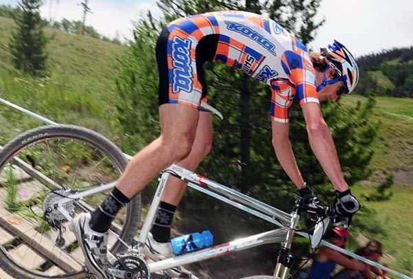 Barry Wicks (Kona) heads down a wooden ramp.