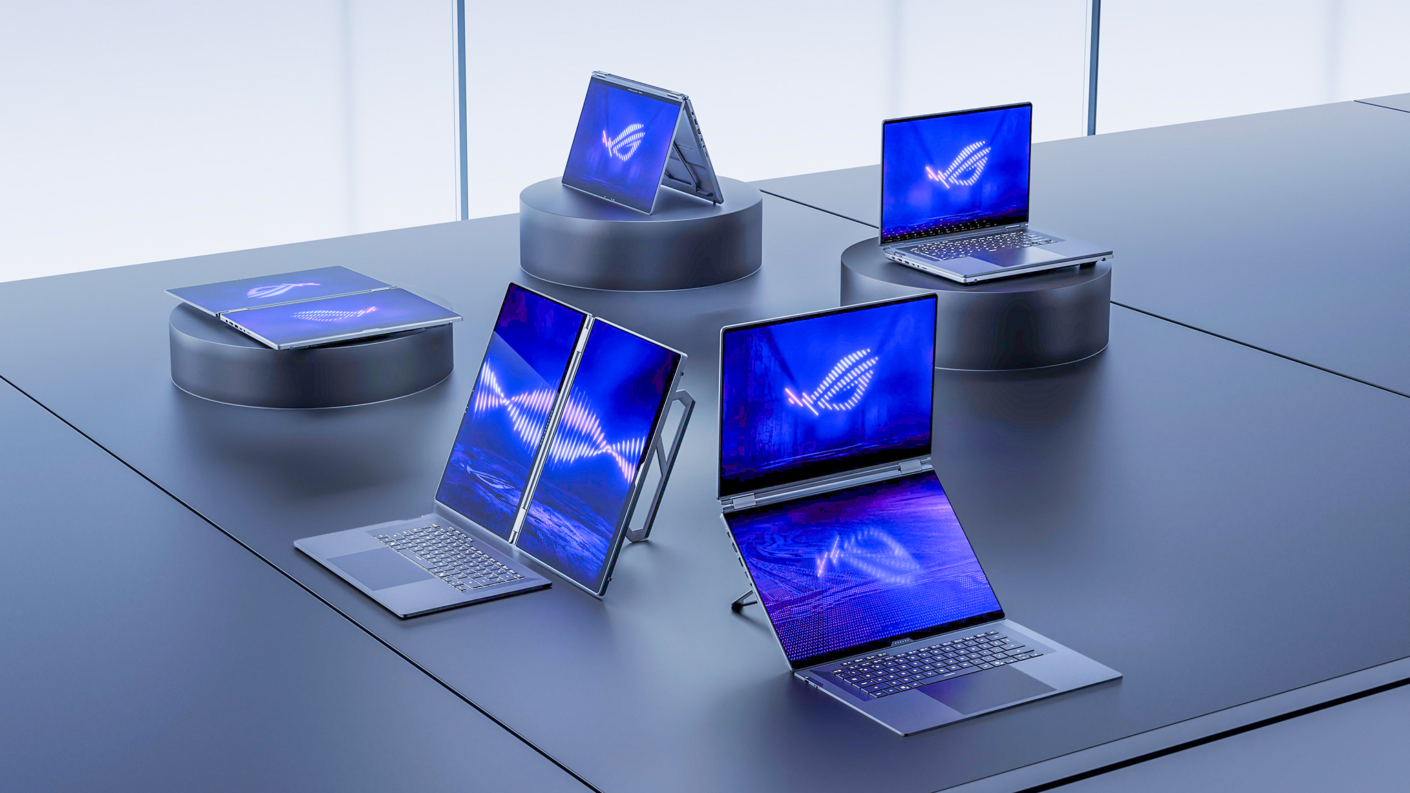 Several ASUS Zephyrus Duo and Zenbook Duo devices. 