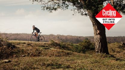 Image shows a rider reaping the benefits of cycling outside.