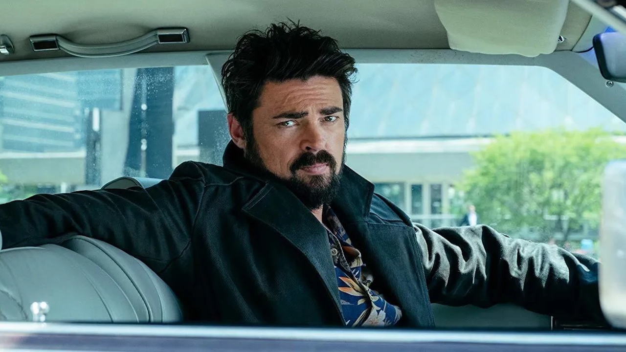 Karl Urban at the wheel of a car in The Boys