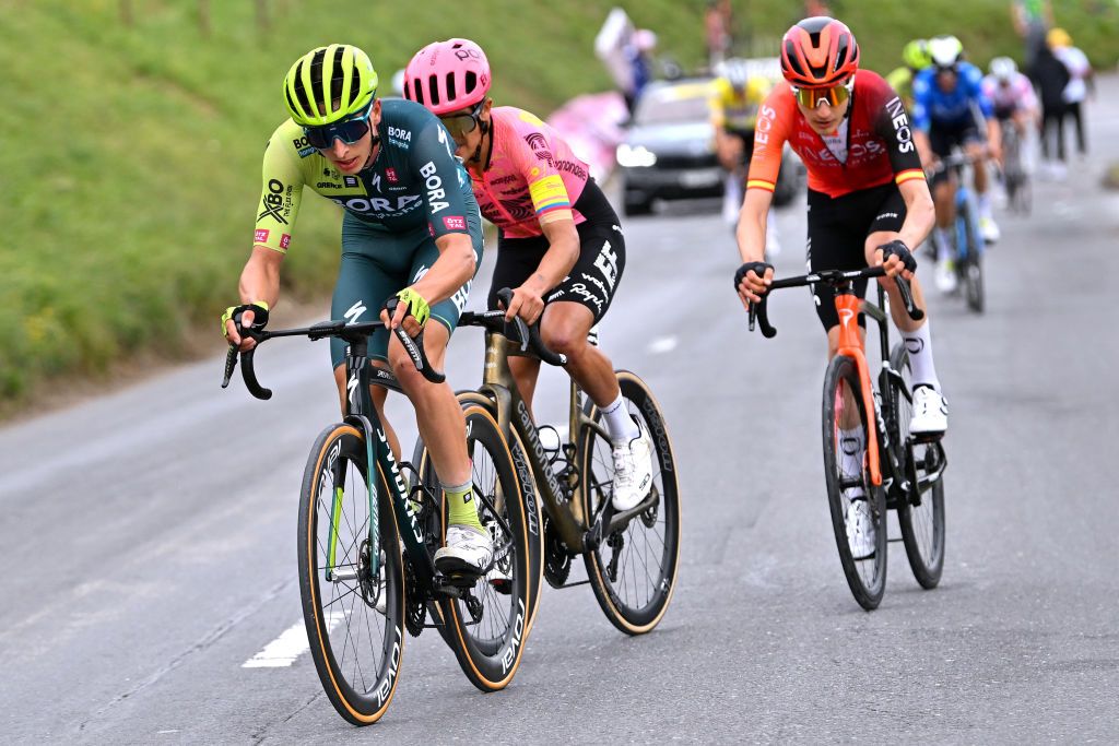 LEYSIN SWITZERLAND APRIL 27 LR Florian Lipowitz of Germany and Team BORA hansgrohe Richard Carapaz of Ecuador and Team EF Education EasyPost and Carlos Rodriguez of Spain and Team INEOS Grenadiers attack in the final climb during the 77th Tour De Romandie 2024 Stage 4 a 1592km stage from Saillon to Leysin 1314m UCIWT on April 27 2024 in Leysin Switzerland Photo by Luc ClaessenGetty Images