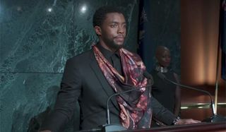 Chadwick Boseman in regular Wakanda clothes in Black Panther