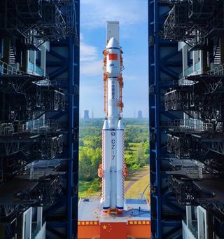 The Long March 7 emerges from its assembly building and rolls towards its pad at the Wenchang Satellite Launch Center in Hainan, China.