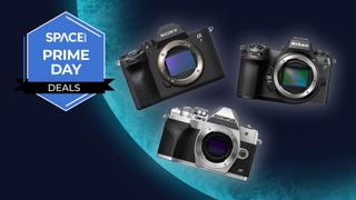 The Sony A7 IV, Nikon ZIII and OM-D E-M10 Mark IV against a blue planet background with a Space.com Prime Day badge in the left corner.