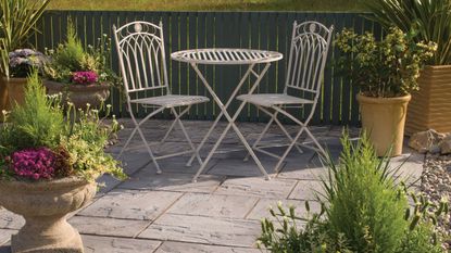ECO paving from Bradstone on patio with chairs