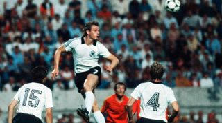 ROME, ITALY - JUNE 22: Hans Peter Briegel of Germany in action during the European Championship Final match between Belgium and Germany at the Olympic Stadium on June 22, 1980 in Rome, Italy. (Photo by Lutz Bongarts/Bongarts/Getty Images)