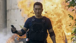 David Jung walking away from giant explosion in Butterfly