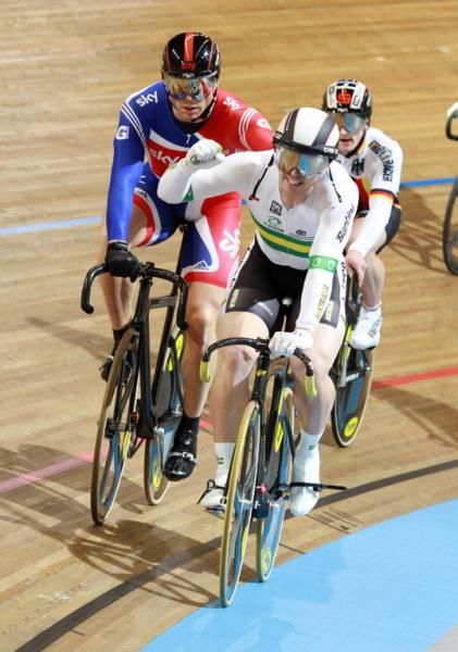 Joy for Perkins as Chris Hoy moves to congratulate the Australian after he won the Keirin gold medal.