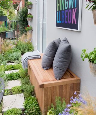 built-in wooden bench seat on a balcony