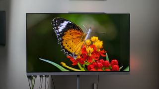 Philips OLED+959 with city landscape at night on screen