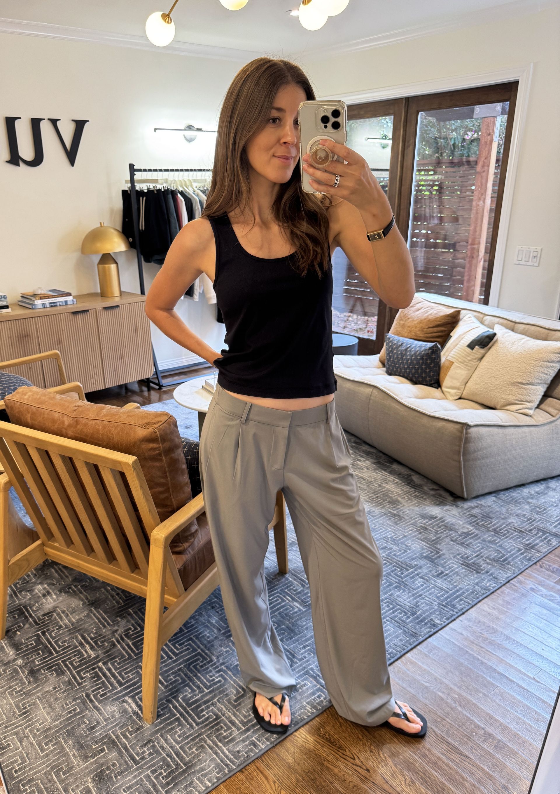 Judith Jones in black top and gray pants.