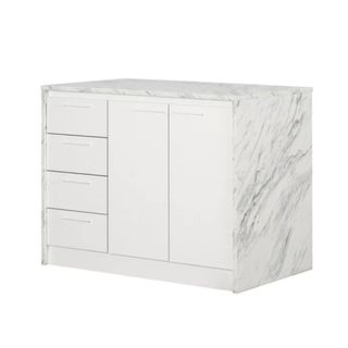 A white kitchen island with a waterfall marble countertop and four drawers and two doors