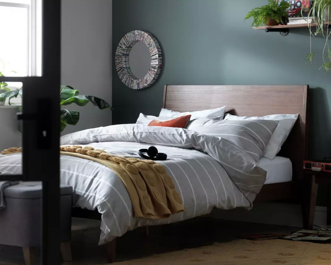 Habitat Clanfield Double Bed Frame in bedroom with grey striped sheets and blue feature wall