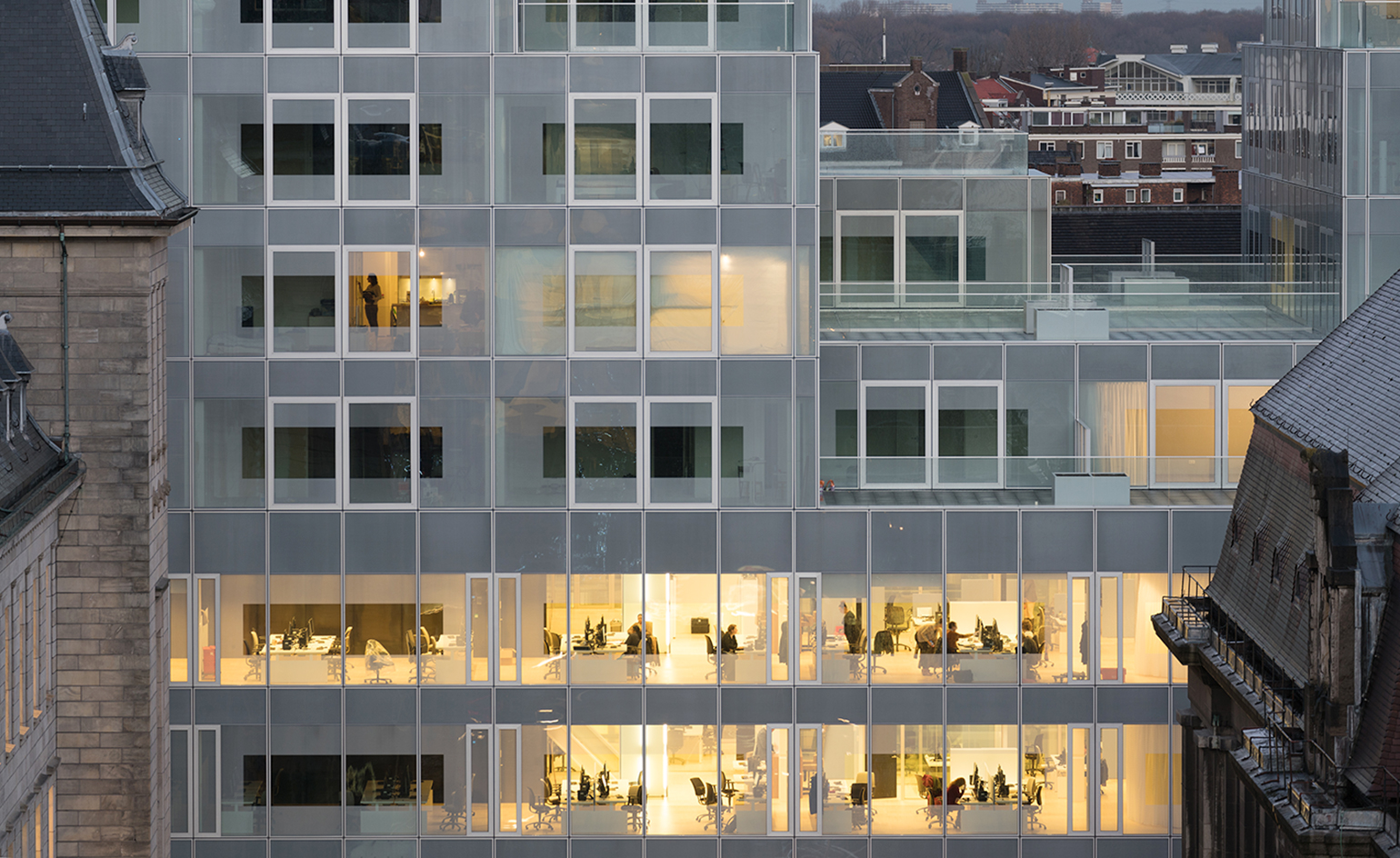 Glass building with meeting rooms inside
