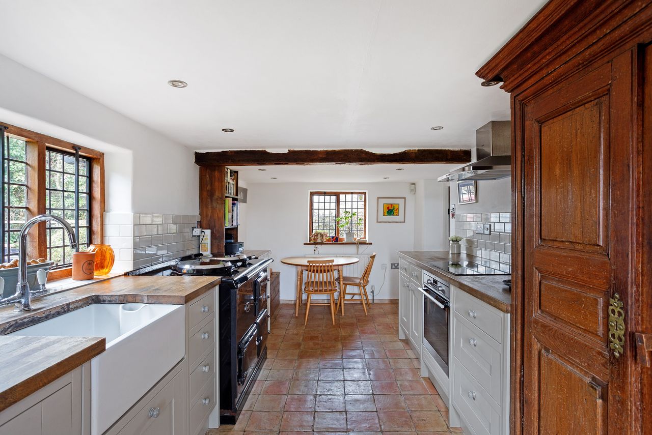 Images of a very wonky house called The Cottage