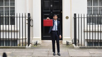 Chancellor Rishi Sunak poses with the Budget Box outside 11 Downing Street 