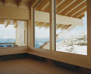 Making the most of the panoramic Alpine views, the restaurant features three (almost) floor-to-ceiling, triple glazed windows