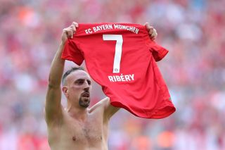 Franck Ribery holds his shirt up to the Bayern Munich fans after scoring on his last Bundesliga appearance for the club, against Eintracht Frankfurt in 2019.