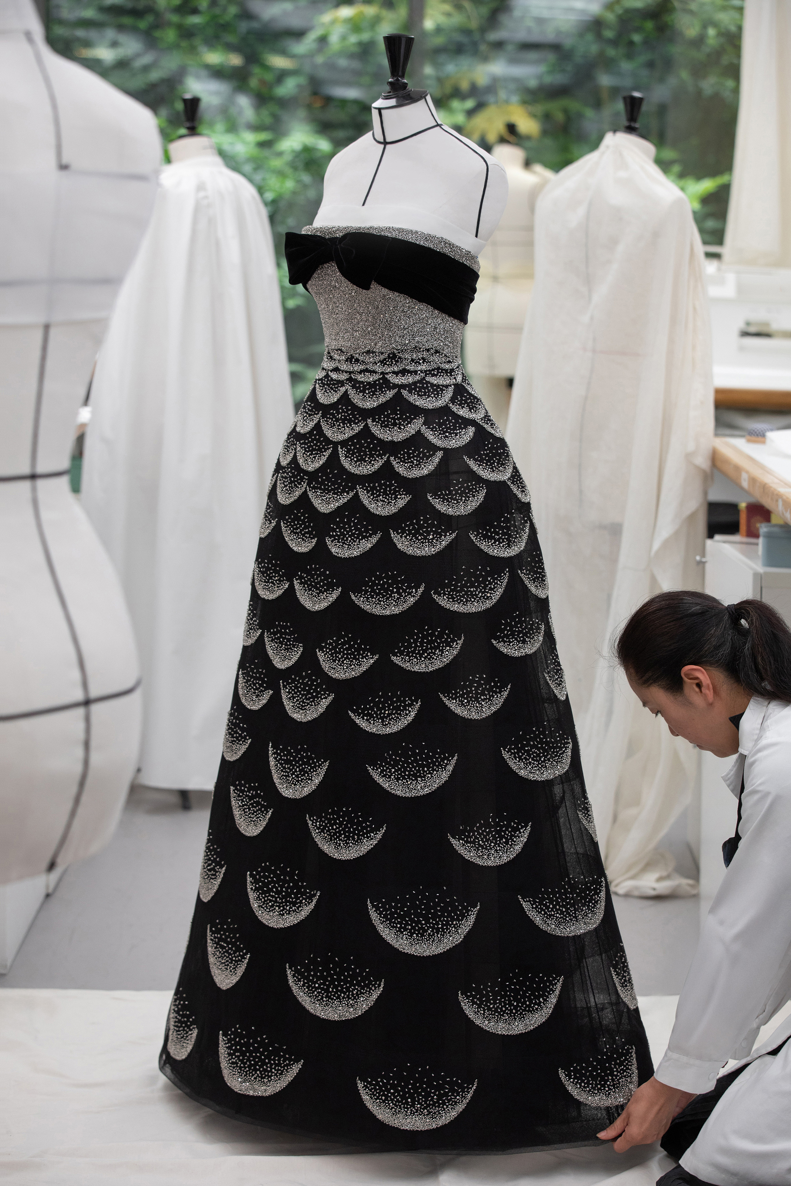 a dior dress on a dress form