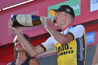 Robert Gesink (LottoNL-Jumbo) drinks a much deserved bottle of champagne after taking his first Grand Tour stage win
