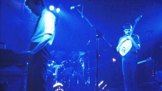 FEBRUARY 29: LYCEUM Photo of Bernard SUMNER and Ian CURTIS and JOY DIVISION, L-R: Bernard Sumner, Ian Curtis - performing live onstag