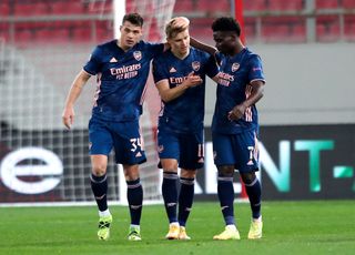 Martin Odegaard (centre) fired Arsenal ahead