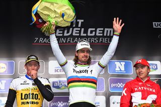 Peter Sagan (Tinkoff) raises his arms in victory on the podium at Gent-Wevelgem