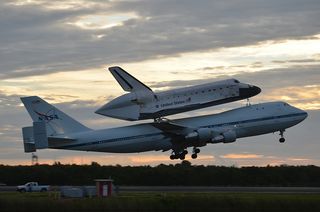 Space shuttle Endeavour, atop its Shuttle Carrier Aircraft, takes off on NASA's last-ever ferry flight from the Kennedy Space Center in Florida on Sept. 19, 2012. Endeavour is headed for Los Angeles, Calif., to be put on public display at the California Science Center.