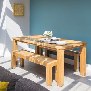dining room with wooden table and benches