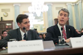 Robert McDowell (r.) in his FCC days, at a congressional hearing with then-FCC chairman Julius Genachowski. 