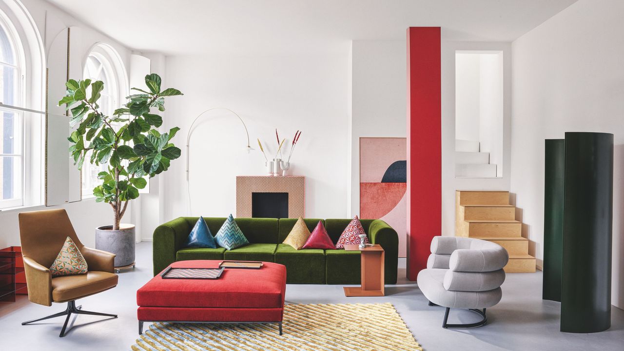 A modern living room with green sofa and a fiddle leaf fig (L)