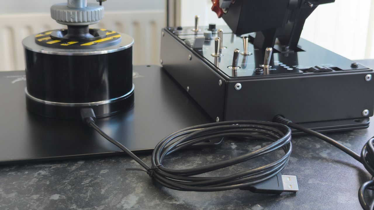 Thrustmaster HOTAS WARTHOG MK II rear side with USB-C to USB-A cables from the throttle base and flight stick