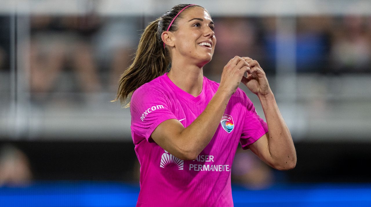 Alex Morgan #13 of San Diego Wave FC interacts with Washington Spirit fans during a game between San Diego Wave FC and Washington Spirit at Audi Field on June 15, 2024 in Washington, DC.