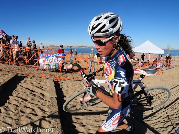 Nicole Duke (Hudz-Subaru) running the steps in the deep sand