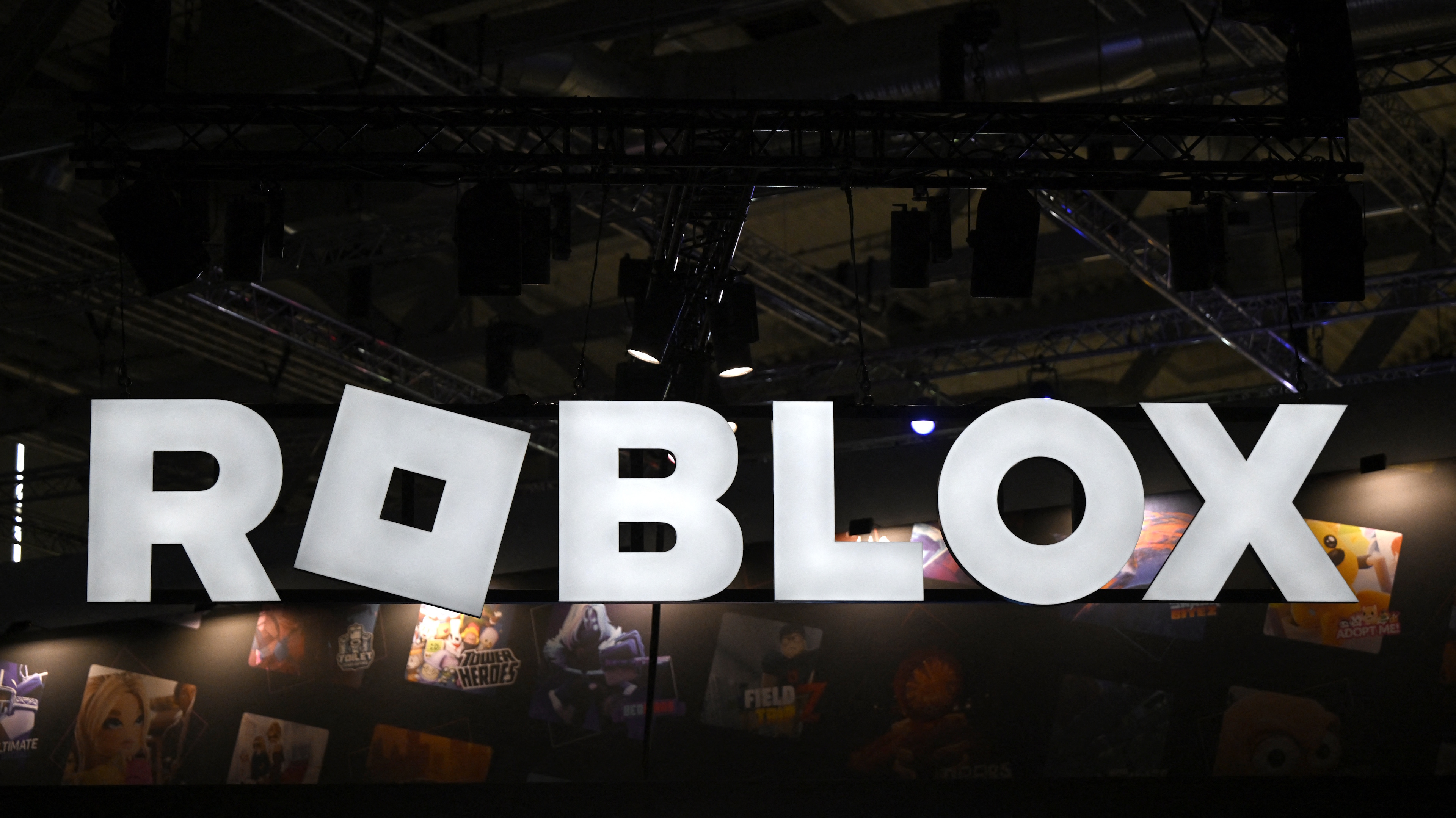 A photo shows the logo of Roblox during the Gamescom video games trade fair at the Trade Fair Center in Cologne, western Germany, on the first day of the fair on August 20, 2025. The 2025 edition of the vast Gamescom trade fair in Cologne, Germany, had its opening night on August 19, 2025 and will be running from August 20 to 24, 2025. (Photo by Ina FASSBENDER / AFP) (Photo by INA FASSBENDER/AFP via Getty Images)