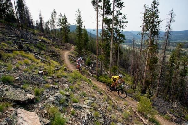 Zeke Hersch (HoneyStinger/Trek) rides along the Colorado trail with a fellow racer close behind.