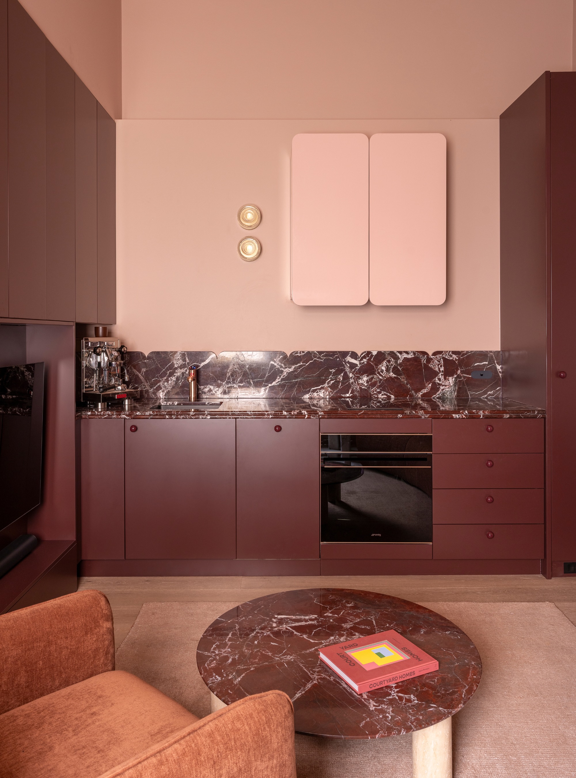 Soft pink and burgundy tonal kitchen color scheme